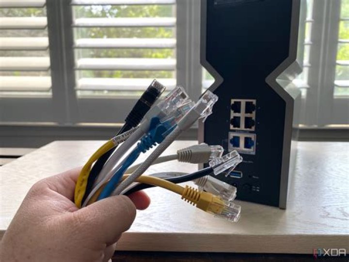 How do I connect my Ethernet cable to my docking station?