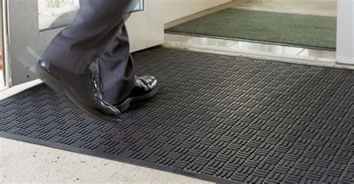 How do you clean floor mats?