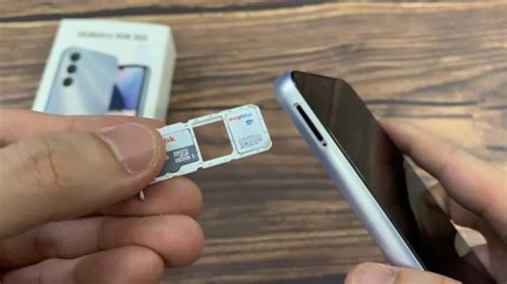 How do you put a SIM card in a Samsung Galaxy A3 2?