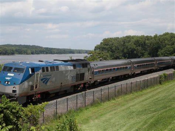 Where can you park outside of NYC by train?