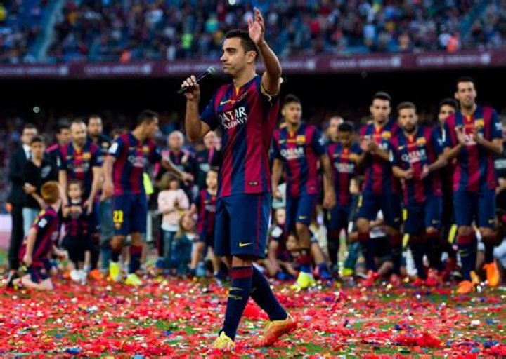 Why did Xavi leave Barcelona?